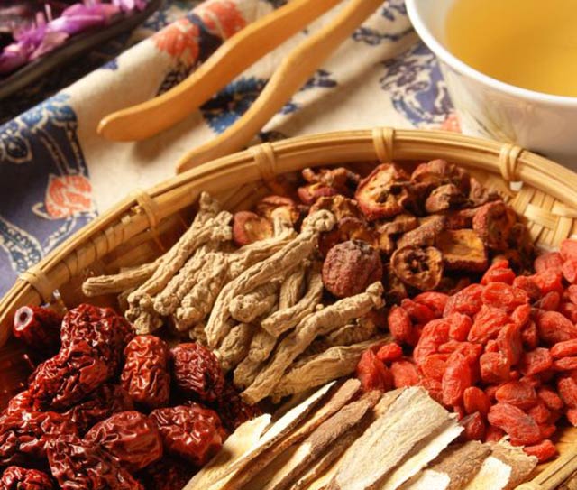 Photo of traditional Chinese medicine herbs spread out on a table
