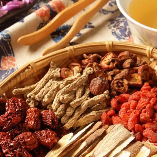 Photo of traditional Chinese medicine herbs spread out on a table